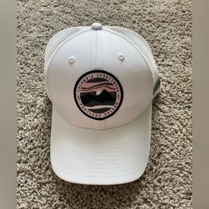 White with pink accent women’s Columbia trucker style hat